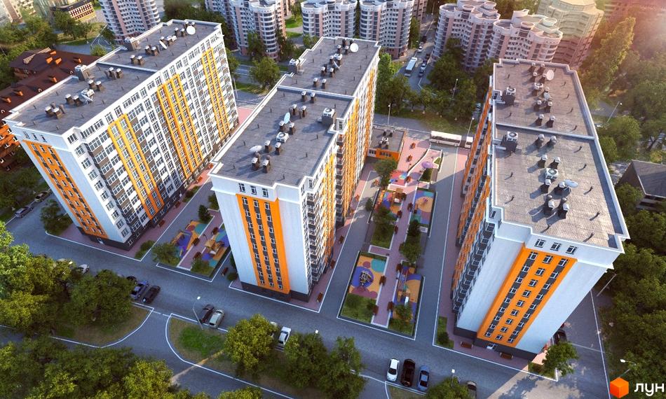 Житловий комплекс Стожари: висотні будинки з помаранчевими елементами фасаду та облаштована прибудинкова територія з дитячими майданчиками та зонами відпочинку.