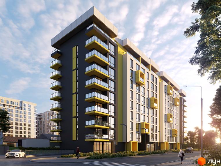 Житловий комплекс AUROOM SUNRISE - це сучасна новобудова з яскравими жовтими акцентами та скляними балконами, розташована біля дороги з пішохідним переходом та деревами.