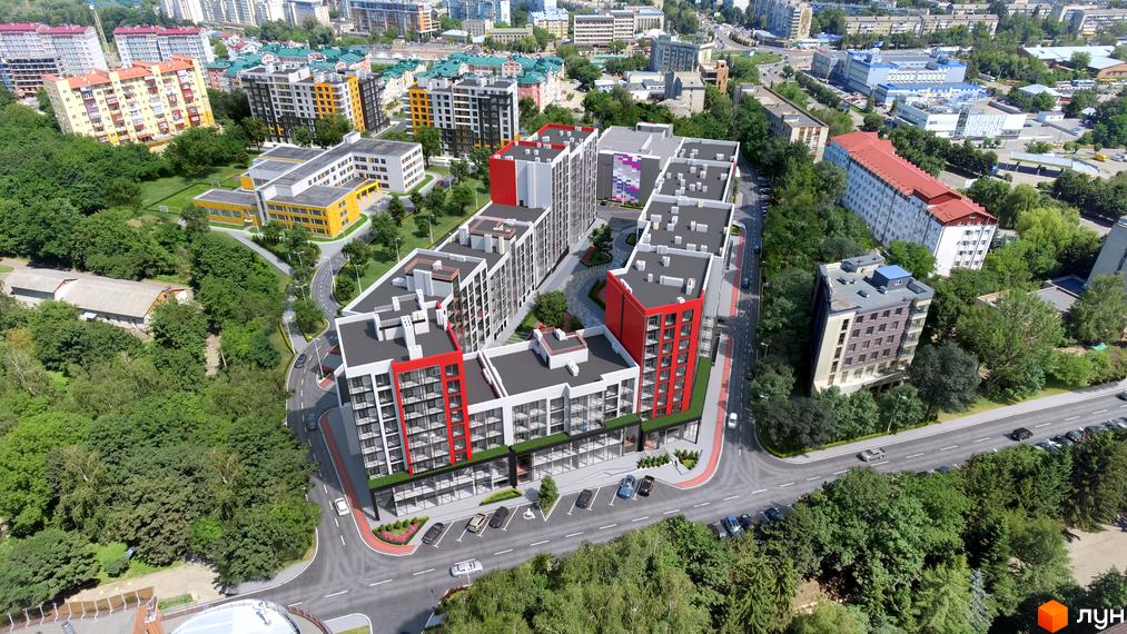 Високоповерхові будинки ЖК Престижний 2 з червоними та білими фасадами, з благоустроєною прибудинковою територією та парковкою для авто.