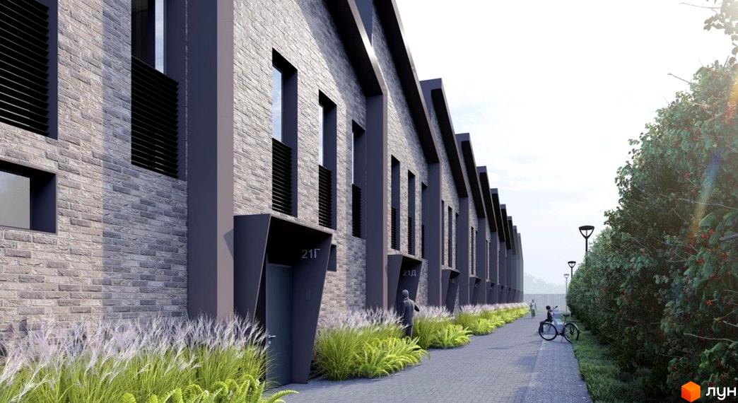Фасад таунхаусів Forest Park Gora з сірої цегли та прибудинкова територія з зеленню та доріжкою. Огляд новобудов.