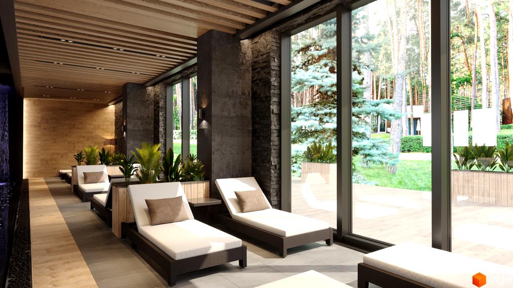 Апарт-комплекс Le Méandre: зона відпочинку з шезлонгами біля великих вікон з видом на ліс. Сучасний дизайн інтер'єру з дерев'яними елементами та кам'яним оздобленням.