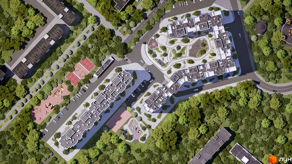 Житловий комплекс Злагода. Вид зверху на житлові будинки з темними дахами та прибудинкову територію з дитячими майданчиками, спортивними майданчиками та зеленими насадженнями.