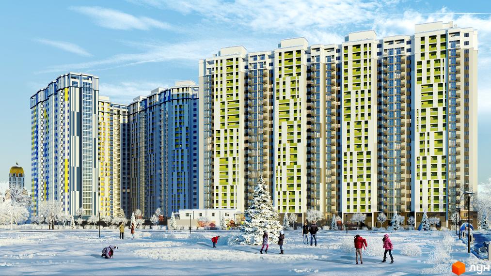 Високі будинки ЖК Злагода з фасадами білого, блакитного та зеленого кольорів. На території перед будинками сніг, ростуть ялинки, гуляють люди.