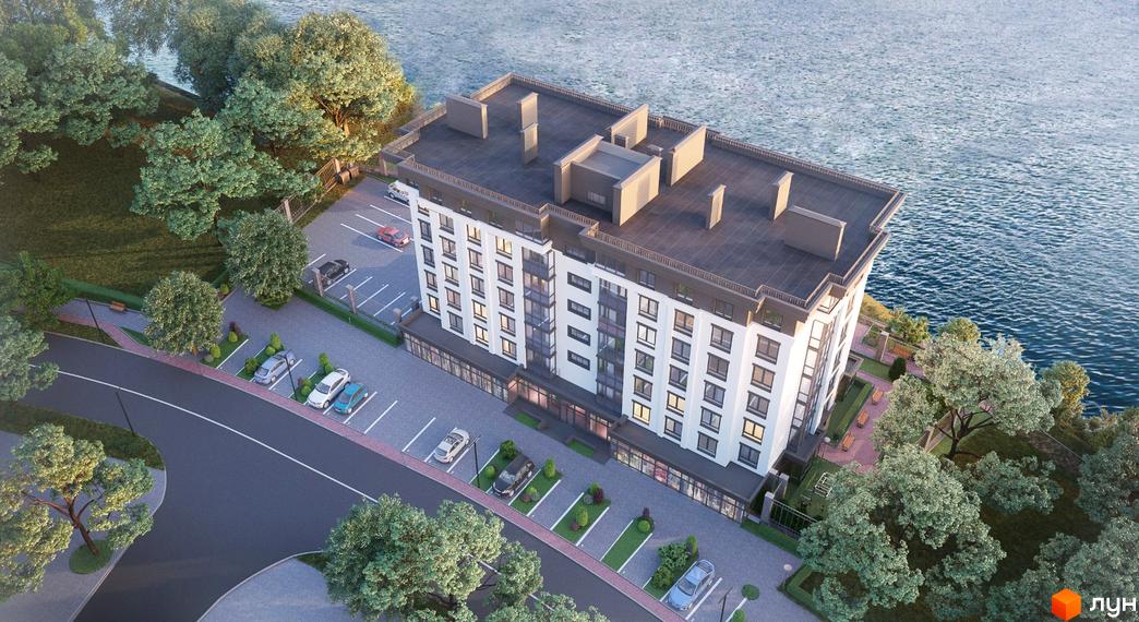 Житловий комплекс White House з біло-сірим фасадом розташований біля води, поруч з ним облаштований паркінг та зелена зона з деревами.