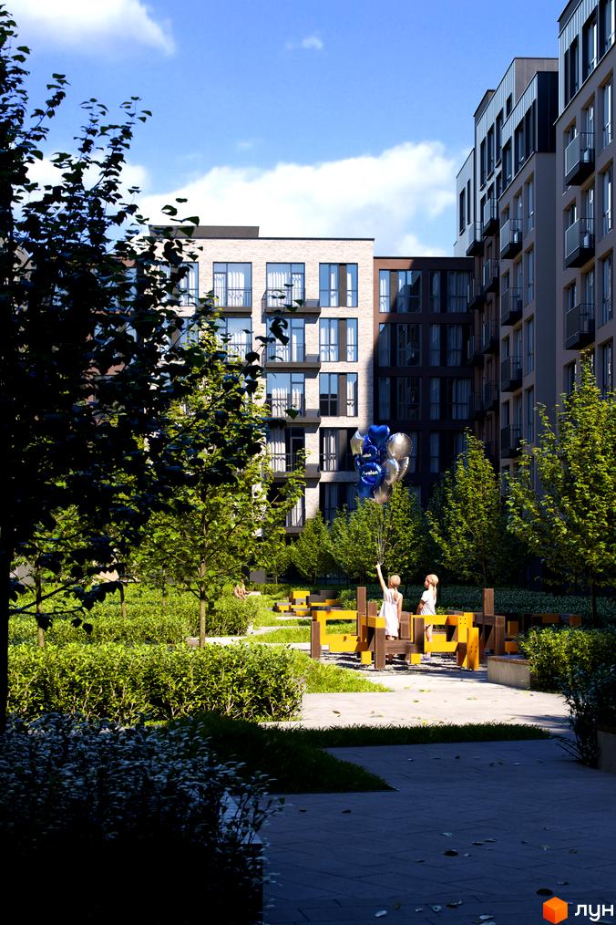 Житловий комплекс Avalon Yard з дитячим майданчиком та зеленими зонами. Сучасна архітектура новобудови та доглянута прибудинкова територія.