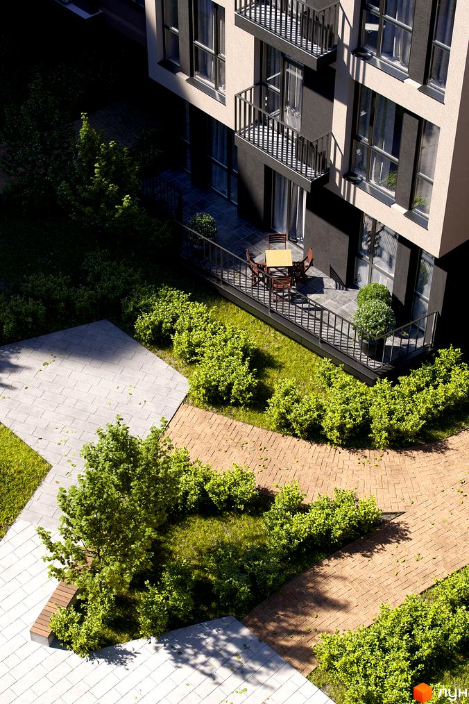 Зовнішній вигляд будинку ЖК Avalon Yard з балконами та вікнами, прибудинкова територія з доріжками та зеленими насадженнями.