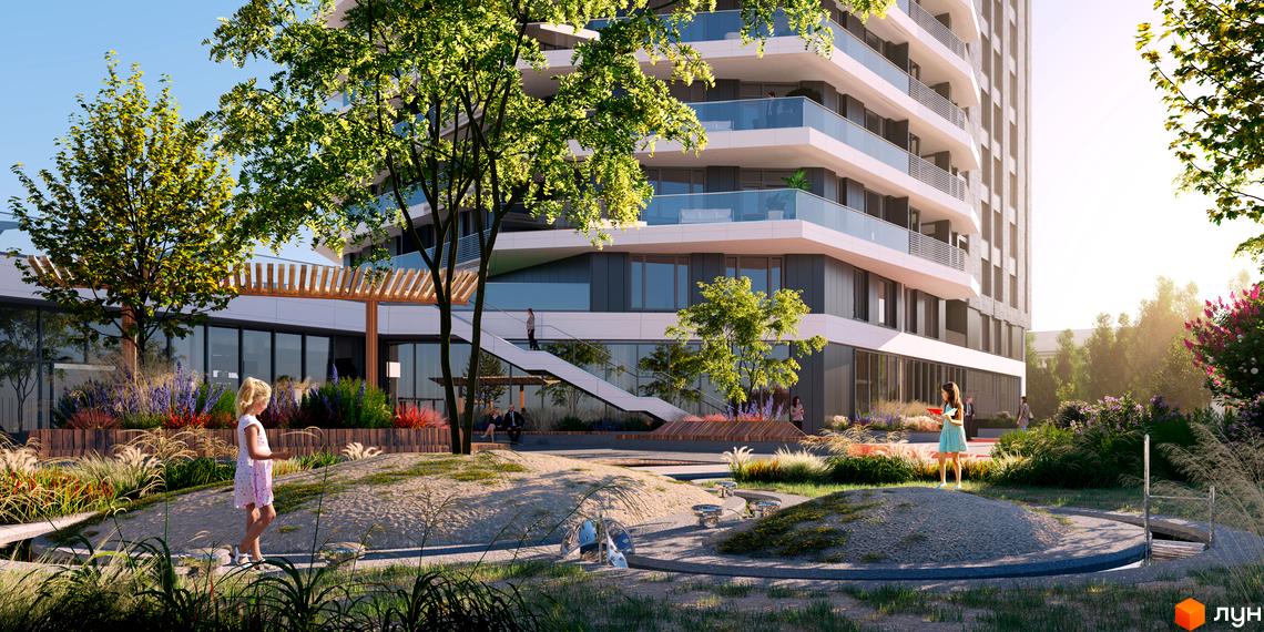 Житловий комплекс Diadans. Сучасна архітектура та зелена прибудинкова територія з дитячим майданчиком. Відкриті балкони та великі вікна.