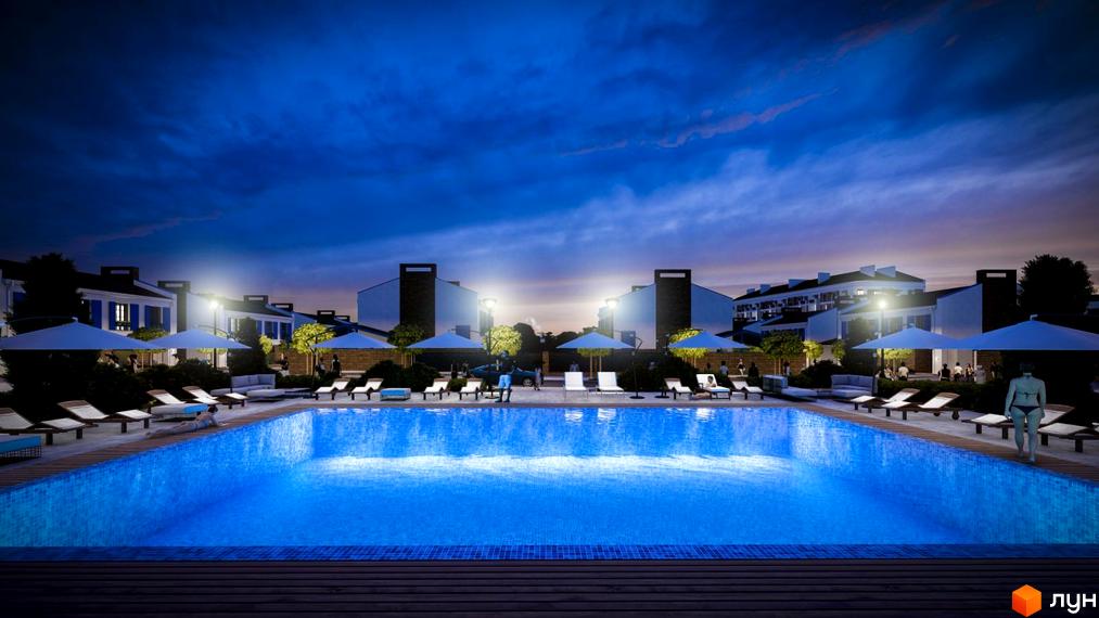 Зображення басейну ввечері в Житловому комплексі Club City. Навколо басейну розташовані лежаки та парасольки для відпочинку мешканців.