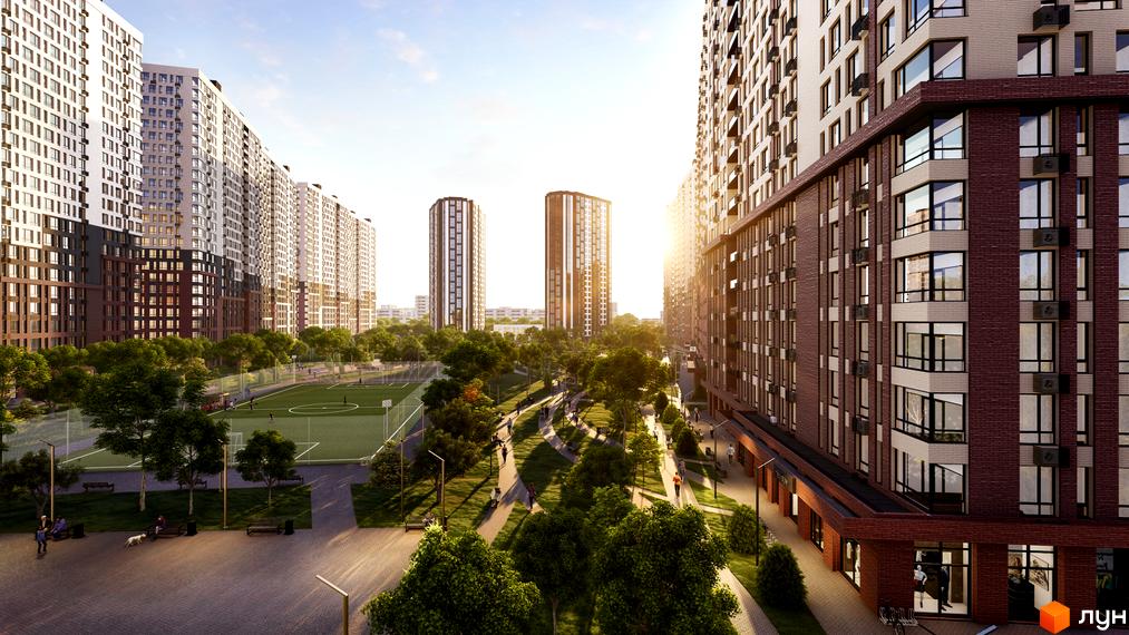Житловий комплекс Star City: високі будинки з цегляним оздобленням та великими вікнами, зелена прибудинкова територія з футбольною полем та пішохідними доріжками.