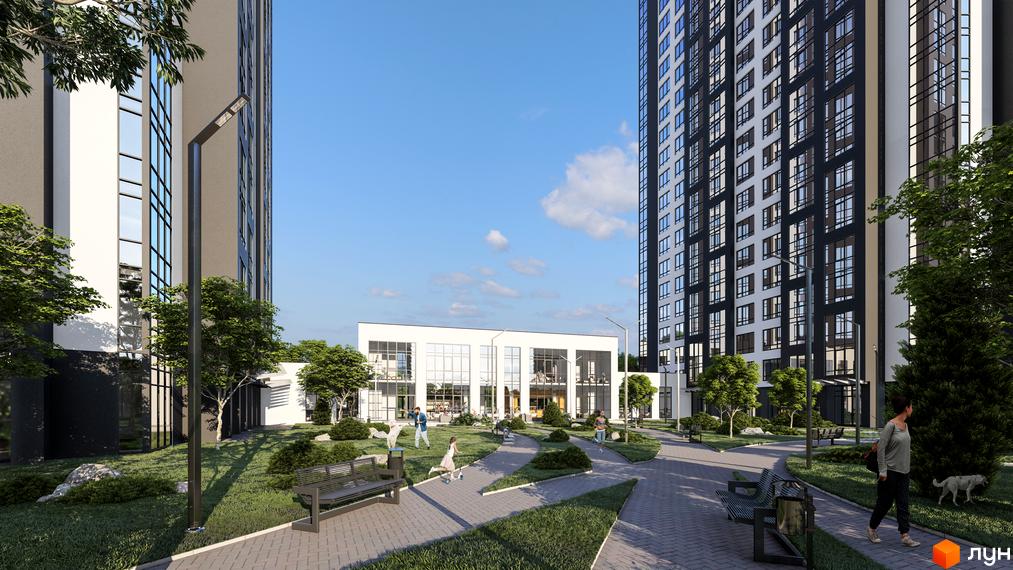 Високі будинки ЖК Star City з панорамними вікнами та доглянутою прибудинковою територією з зеленими насадженнями, алеями та місцями для відпочинку.