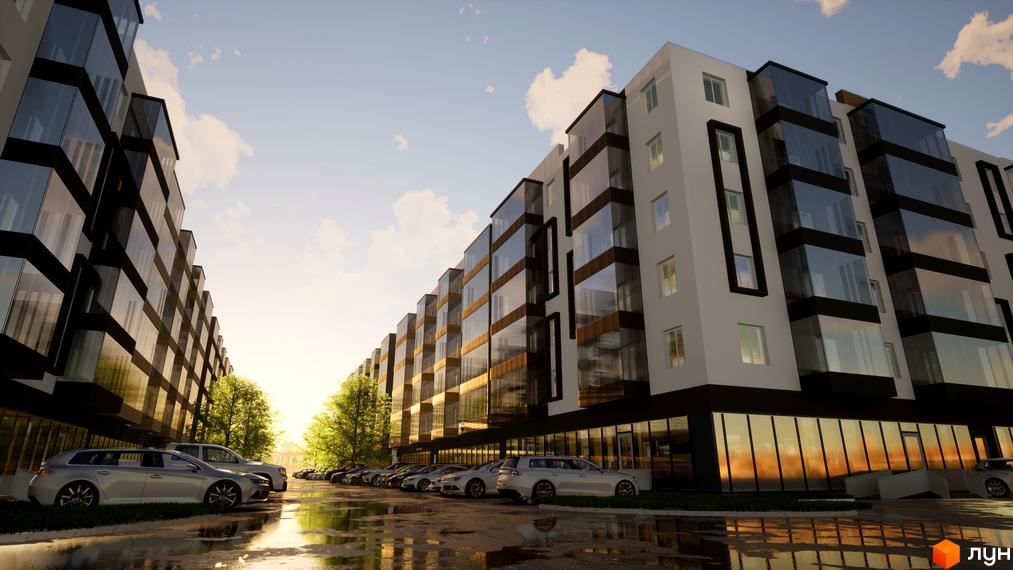 Житловий комплекс BRUSSELS з панорамним склінням. Парковка з автомобілями біля будинку.