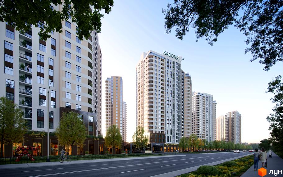 Вид на житловий комплекс KADORR City з високими будинками та комерційними приміщеннями на першому поверсі. Навколо комплексу висаджені дерева та облаштована пішохідна зона.