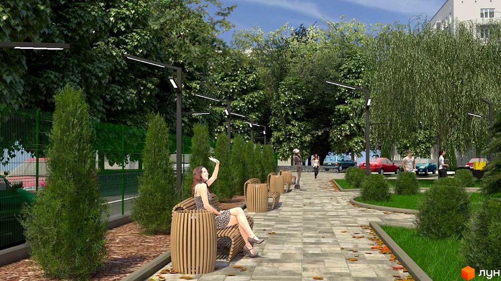 Прогулянкова алея житлового комплексу KromaxBud з лавками та деревами. Зелена огорожа та автомобілі на фоні.