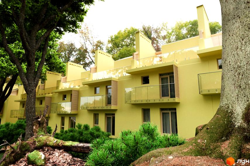 Житловий комплекс Royal Estate з жовтим фасадом, скляними балконами та зеленою прибудинковою територією з деревами та кущами. Зовнішній вигляд будинку та навколишнього ландшафту.