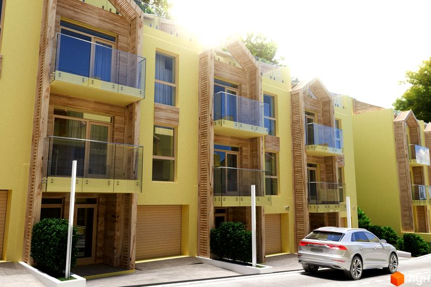 Житловий комплекс Royal Estate з жовтим фасадом, дерев'яними елементами та скляними балконами. Перед будинком розташована дорога та зелені кущі.