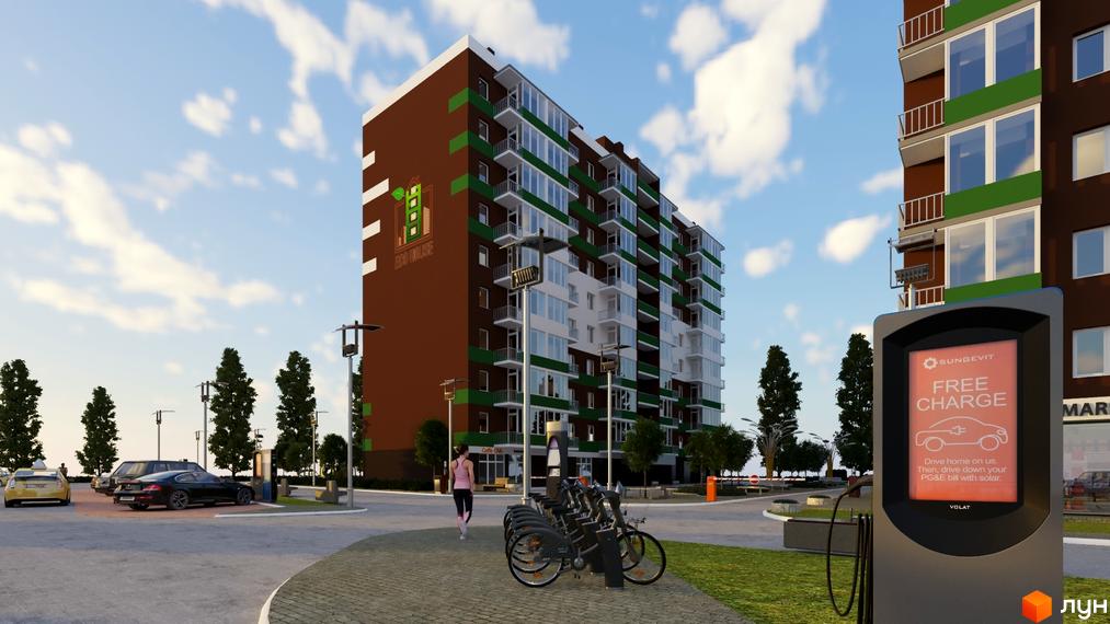 Новобудова Eco House з коричнево-зеленим фасадом та балконами. На прибудинковій території є електрозарядка для авто, велопарковка та дерева.
