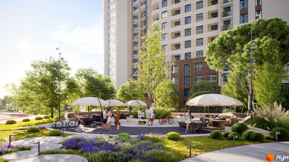 Житловий комплекс KADORR City з сучасною архітектурою та затишною прибудинковою територією для відпочинку.