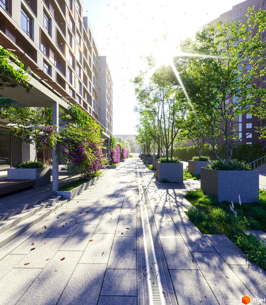 Клубний будинок К12 з озелененою прибудинковою територією та пішохідною алеєю. Сучасна архітектура комплексу з великими вікнами та балконами.