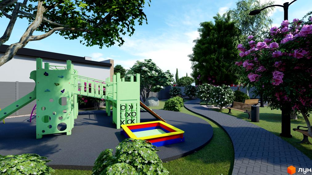 Дитячий майданчик у житловому комплексі КМ Затишний з гірками, пісочницею та скеледромом. Навколо зелені насадження та зона відпочинку з лавками.