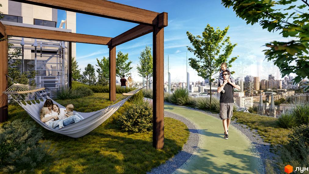 Сімейний відпочинок на терасі ЖК Montreal House з видом на місто. Затишна зона з гамаком та зеленою зоною для прогулянок.