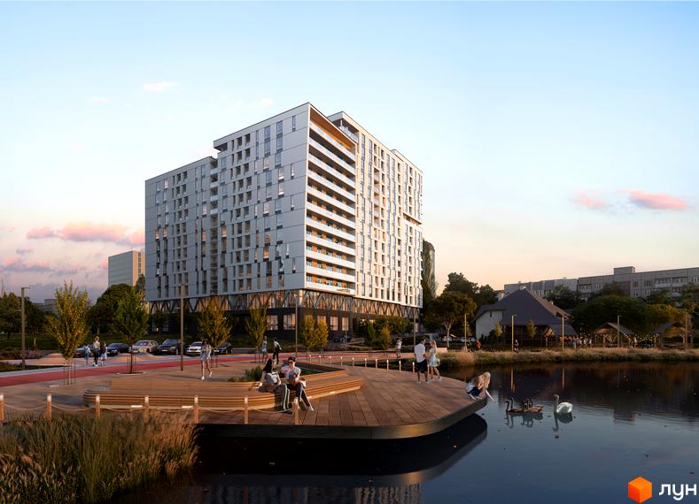 Зображення Житлового комплексу Pictorial з великим будинком та облаштованою прибудинковою територією з озером.