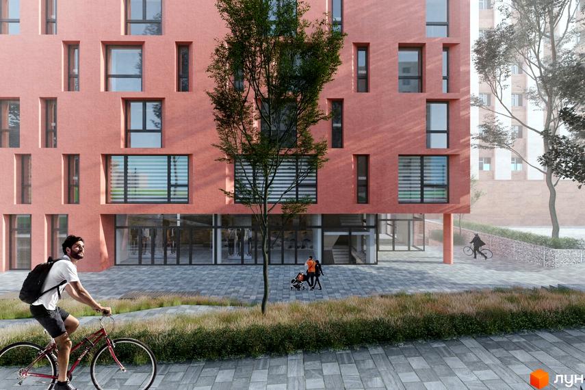 Фасад Апарт-комплекс Кампус з вікнами різного розміру та скляними вітринами на першому поверсі. Прибудинкова територія з деревом, газоном та бруківкою.