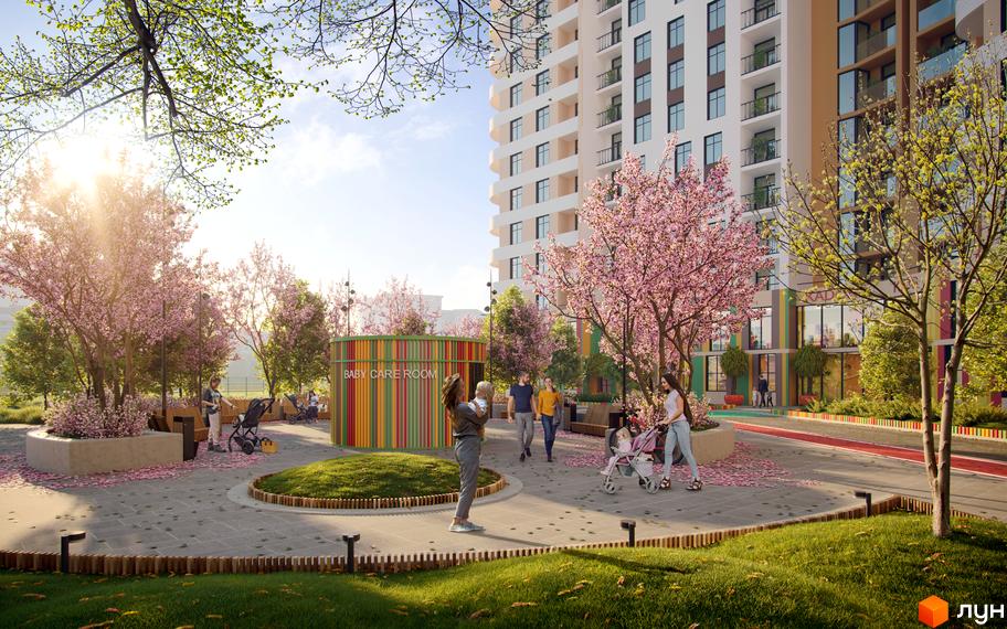 Житловий комплекс KADORR City з дитячою кімнатою та квітучими деревами. Сучасний житловий комплекс з доглянутою прибудинковою територією.