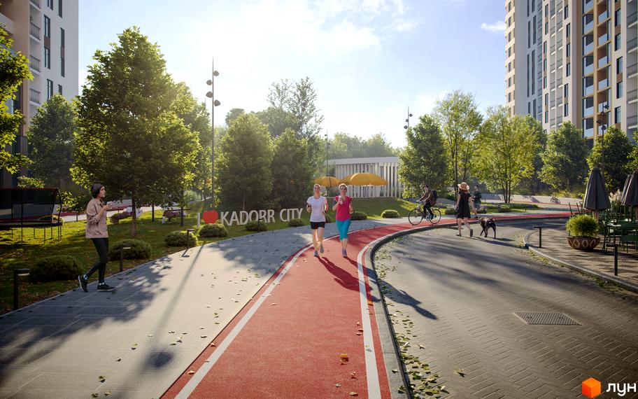 Новобудова KADORR City з зоною для пробіжок та відпочинку. На території комплексу є доріжки для бігу, зелені зони та місця для сидіння.