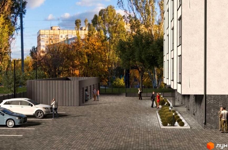 Клубний будинок „Березинський“: світлий фасад, темні віконні рами, цоколь з цегли. Облаштована прибудинкова територія з паркінгом та озелененням.