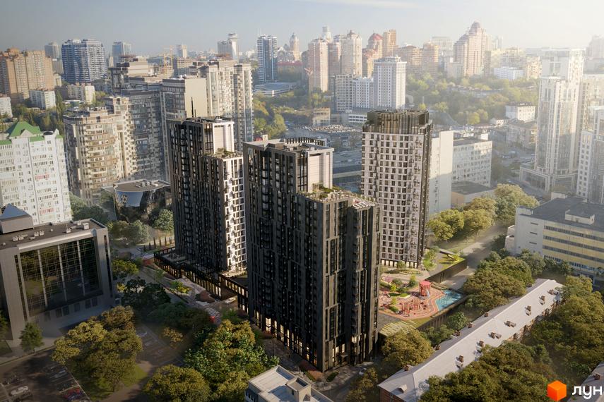 Житловий комплекс TRIIINITY - сучасна архітектура з висотними будинками та доглянутою прибудинковою територією з дитячим майданчиком.