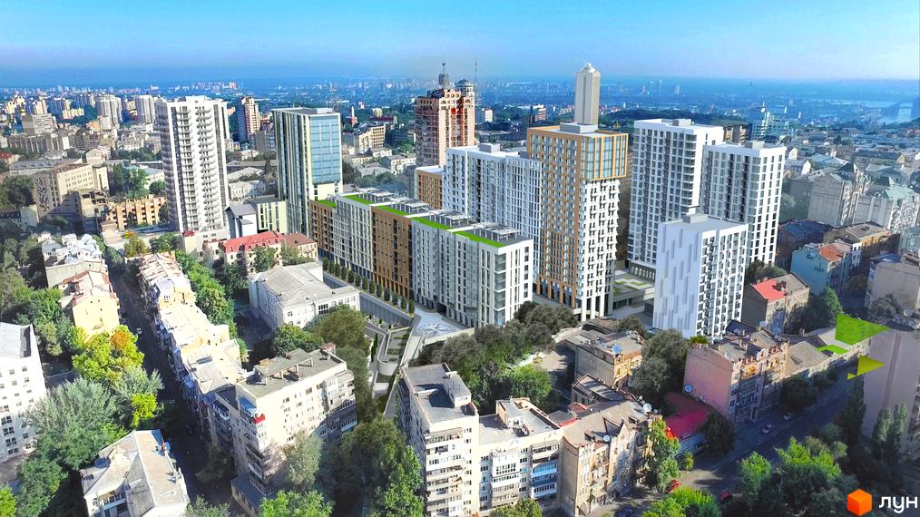 Житловий комплекс Ярославів Град - сучасна архітектура з різнорівневими корпусами та зеленими терасами. Навколо комплексу розташовані дерева та міська забудова.