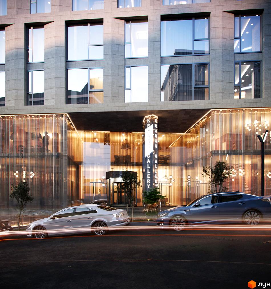 Зображення фасаду та входу до Житлового комплексу Krauss Gallery. Вигляд будівлі з вулиці, видно автомобілі та освітлення.