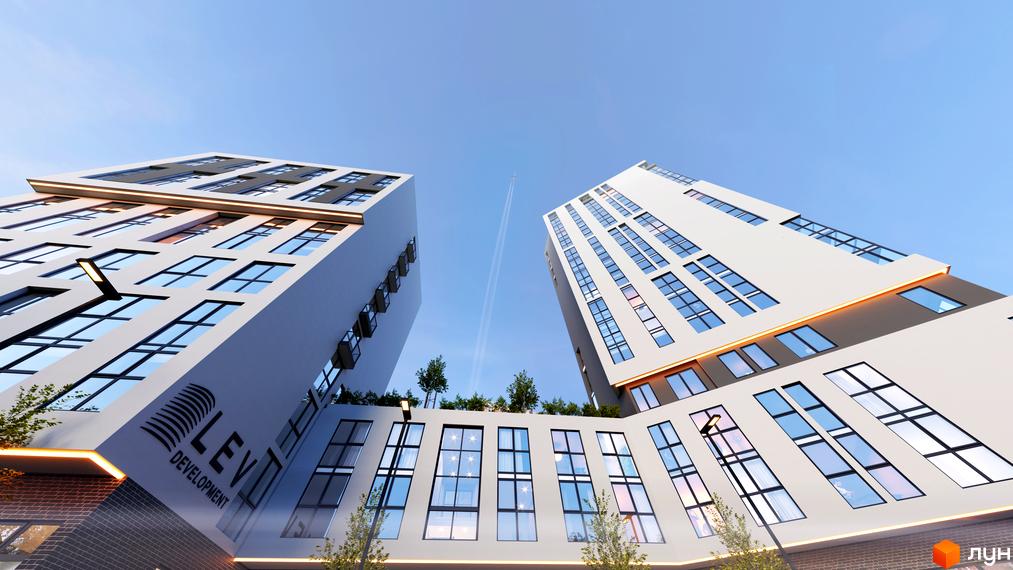 Дві високі білі будівлі Житлового комплексу ARTHOUSE park з великими вікнами та підсвічуванням. На даху нижньої частини комплексу розташовані зелені насадження.