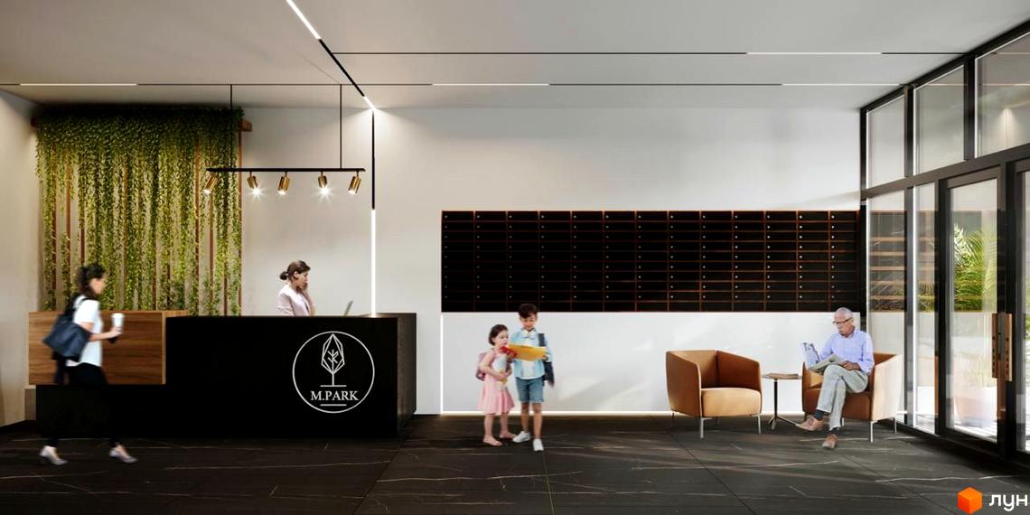 Інтер'єр холу в ЖК M.Park з рецепцією, поштовими скриньками, зоною відпочинку та скляними дверима.