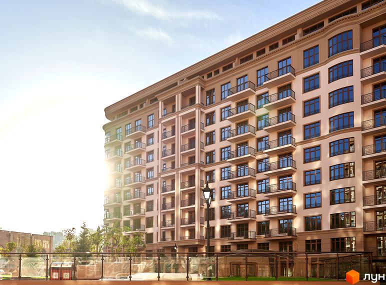 Житловий комплекс 52 Перлина (Pechersk Plaza). Висока будівля з балконами та великими вікнами. На передньому плані скляна огорожа та ліхтар.