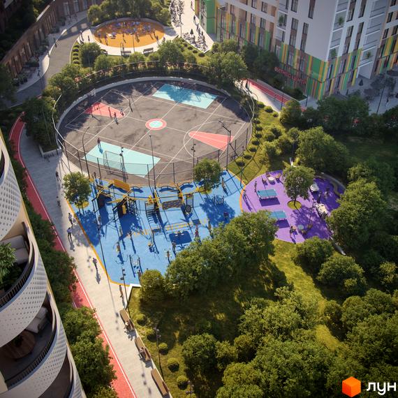 Комплекс KADORR City з баскетбольним майданчиком, дитячим майданчиком та зоною для настільного тенісу. Навколо комплексу зелені насадження та доріжки для прогулянок.
