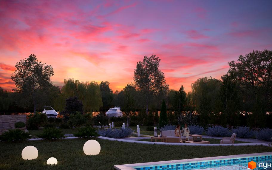 Котеджне містечко КМ River Garden з зоною відпочинку біля води та мальовничим заходом сонця. На території є басейн та зелені насадження.