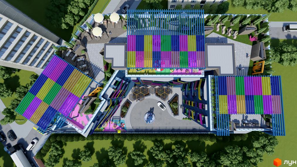 Житловий комплекс Калейдоскоп з яскравим фасадом та різнокольоровими навісами. На території розташовані зони відпочинку з парасольками та зелені насадження.