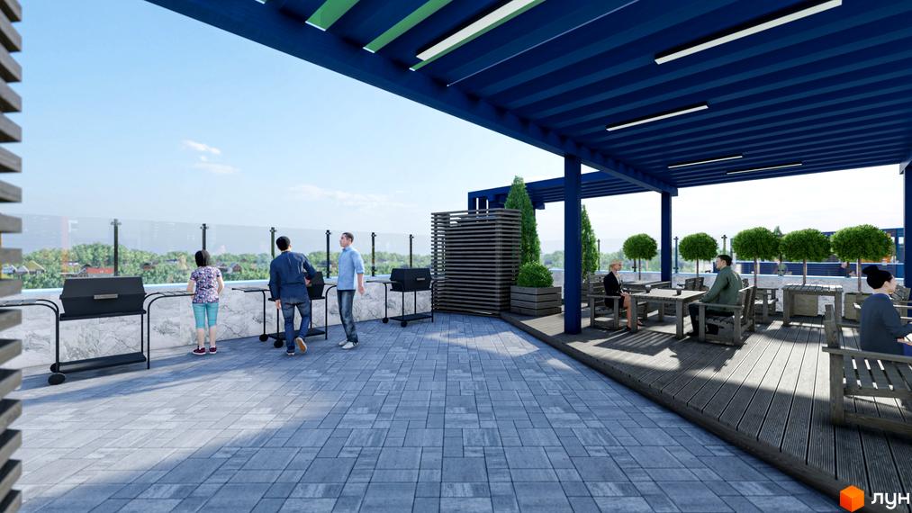 Тераса житлового комплексу Калейдоскоп з зонами для барбекю та відпочинку. На терасі розташовані столики, стільці, зелені насадження та люди.