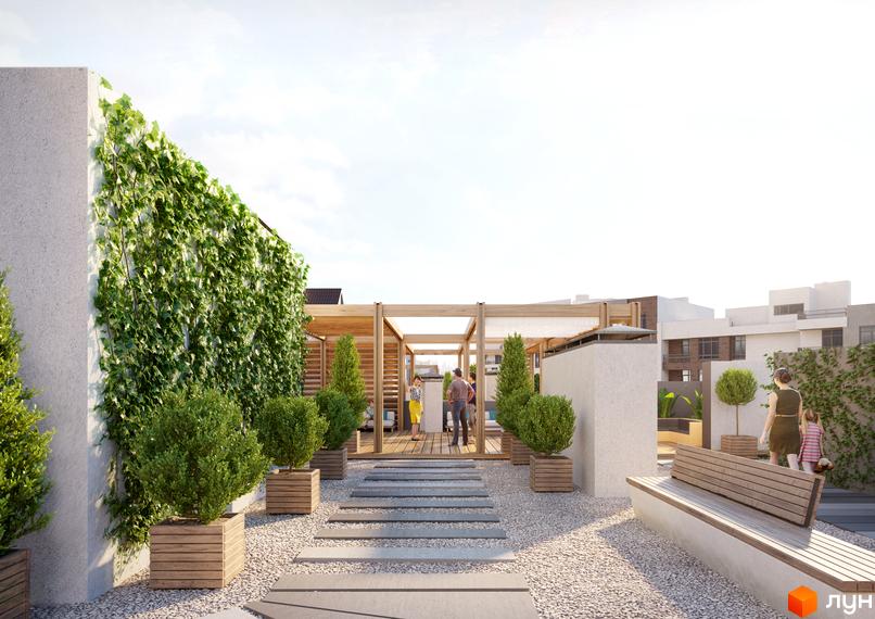 Житловий комплекс Синергія Сіті: зелена зона відпочинку з перголами та лавками, що прилягає до сучасних будинків.