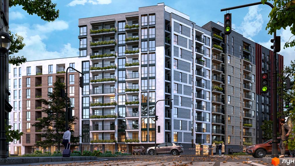 Зовнішній вигляд новобудови ЖК Mill Town з цегляним та сірим фасадом, балконами із зеленню та великими вікнами. Навколо будинку дерева та міська вулиця.