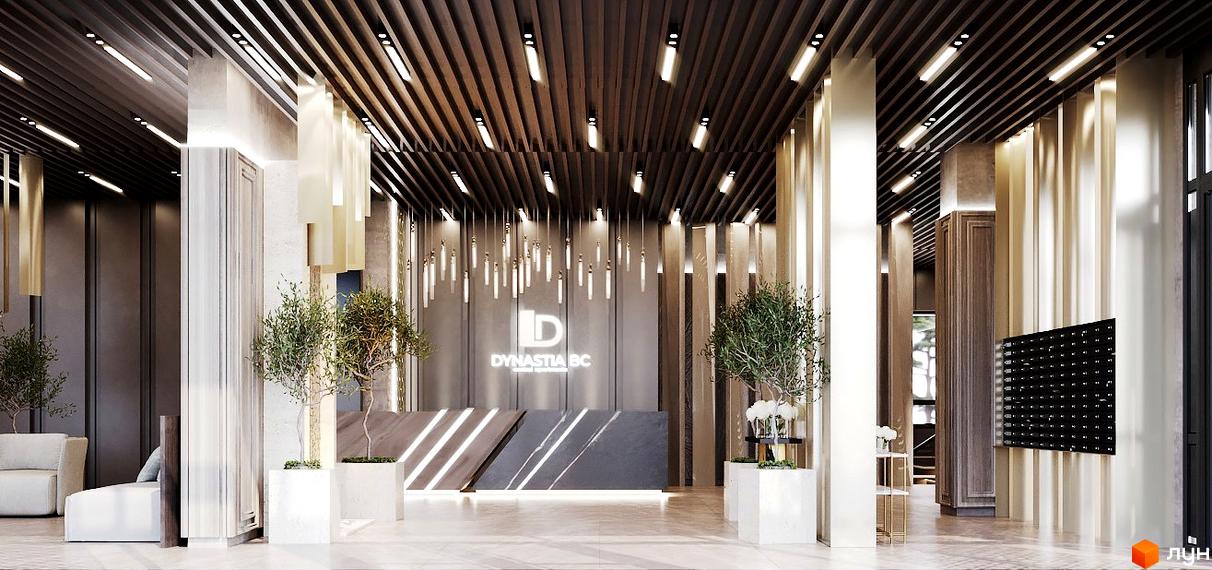 Інтер'єр холу Житлового комплексу Dynastia BC з ресепшеном, декоративним освітленням та рослинами у вазонах.