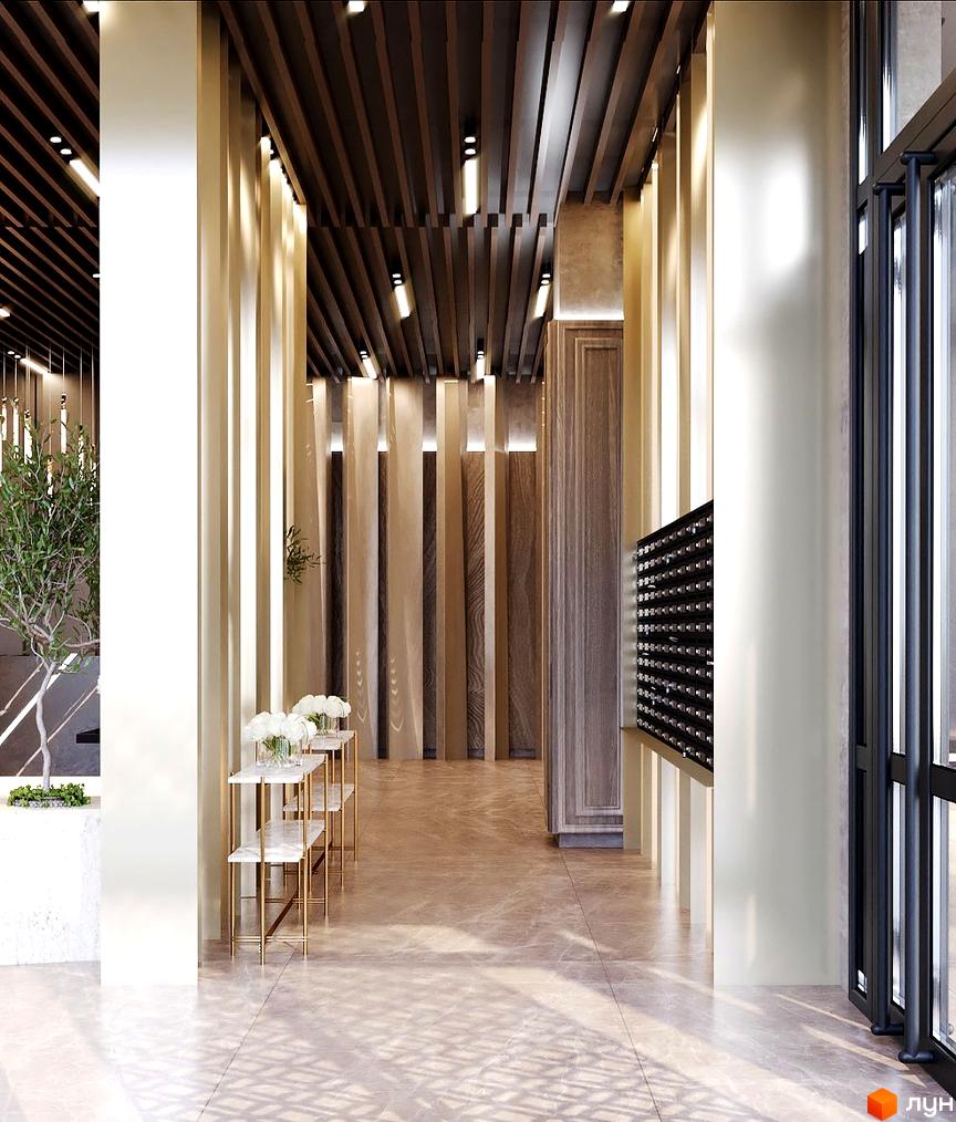 Інтер'єр вхідної групи Житлового комплексу Dynastia BC з декоративними колонами та поштовими скриньками. Вигляд на коридор з рослинами.