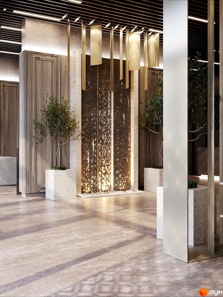 Інтер'єр холу з декоративним оздобленням стін та рослинами у Житловому комплексі Dynastia BC. Вигляд на вхідну зону з елементами дизайну.