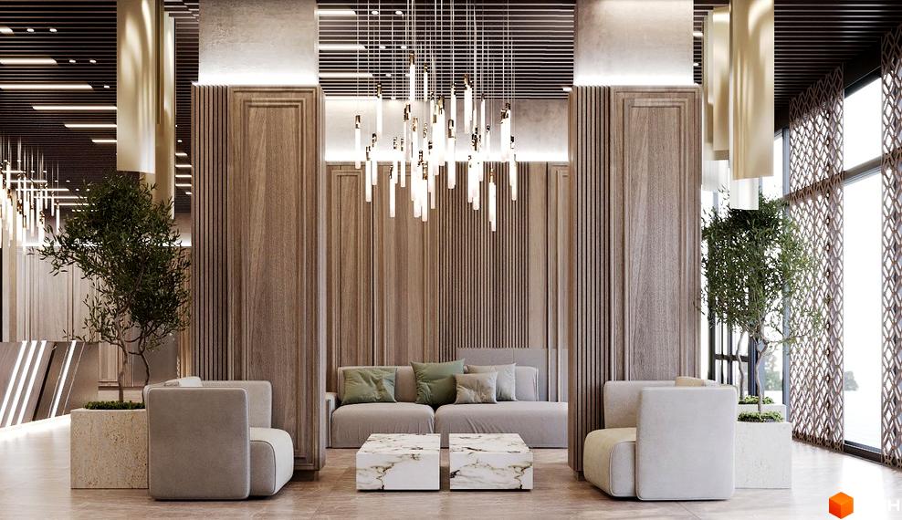 Інтер'єр холу Житлового комплексу Dynastia BC з м'якими меблями та декоративними рослинами. Світлий простір з елементами оздоблення деревом.