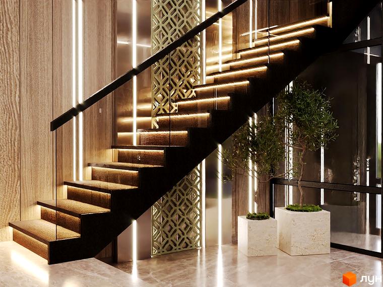 Інтер'єр з дерев'яними сходами з підсвічуванням у Житловому комплексі Dynastia BC. Поруч розташовані декоративні рослини у квадратних вазонах.