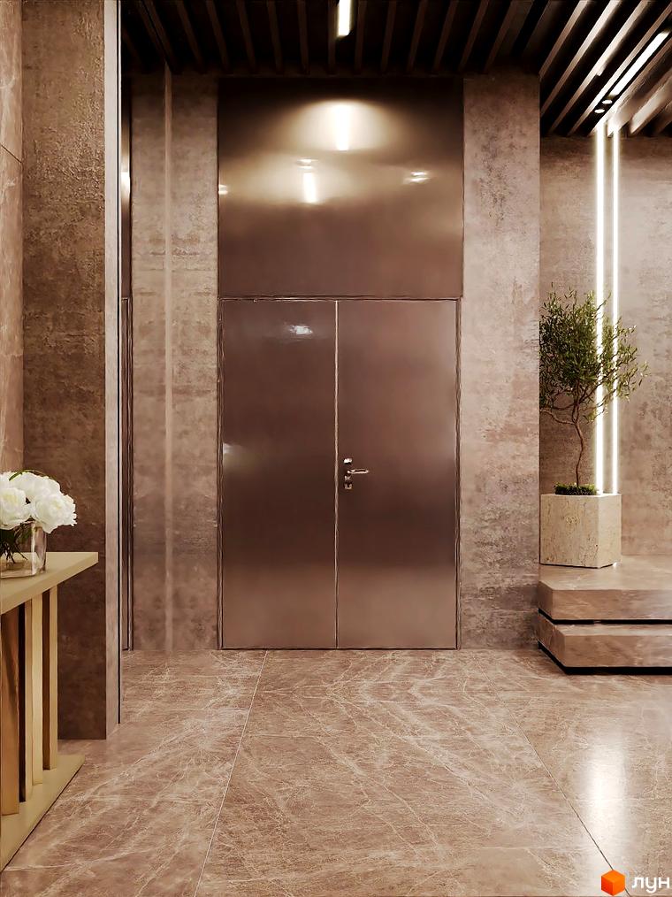 Інтер'єр з металевими дверима в Житловому комплексі Dynastia BC та рослиною у вазоні. Мармурова підлога та світлі стіни.