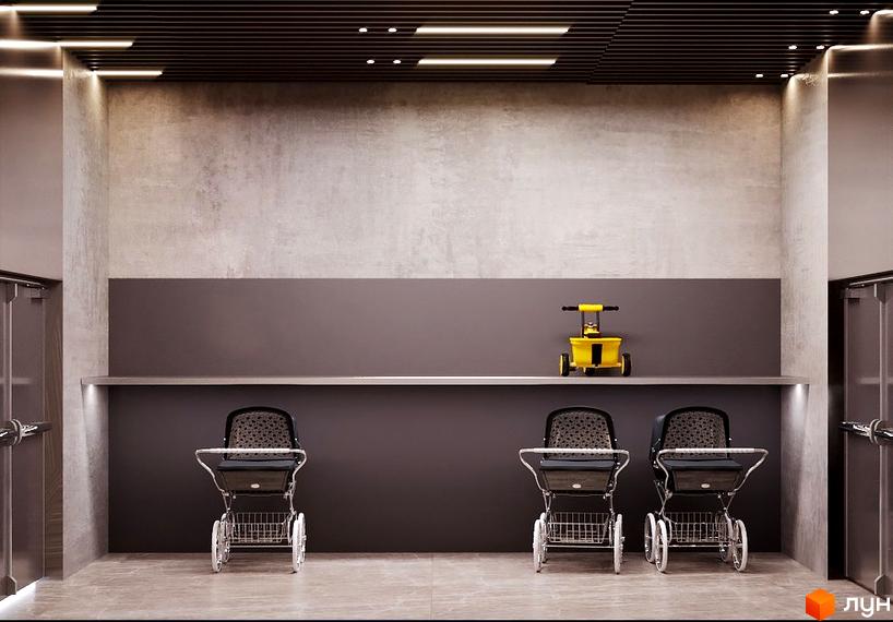 Інтер'єр дитячої кімнати в ЖК Dynastia BC. Сірі стіни, дитячі візочки та жовтий візок.