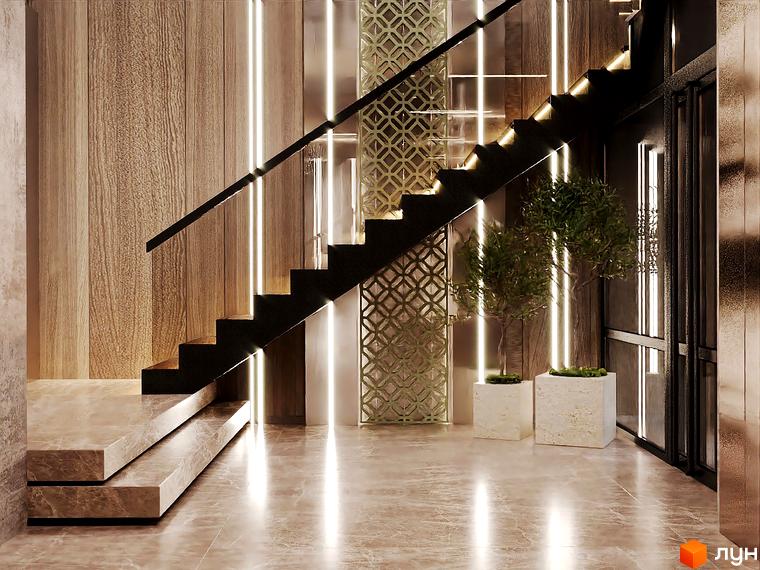 Інтер'єр холу в ЖК Dynastia BC з дерев'яною обробкою стін, сходами з підсвічуванням та рослинами в горщиках на підлозі з мармуровим покриттям.