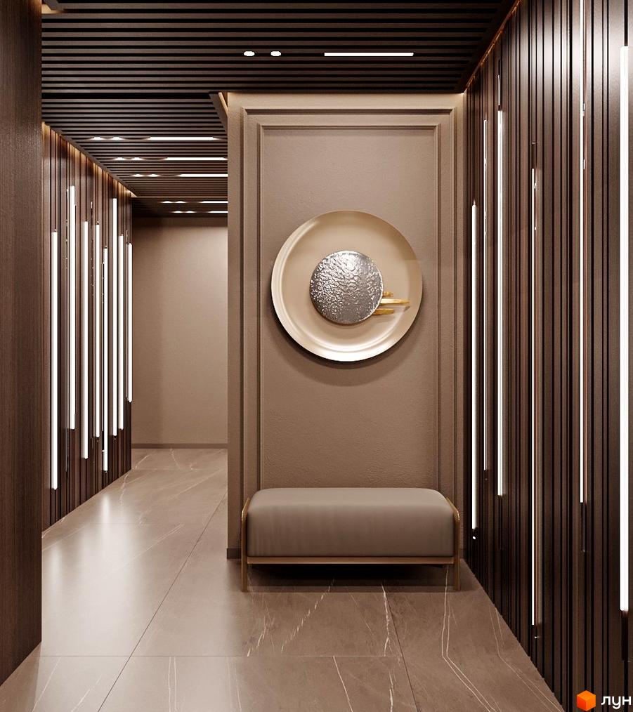 Інтер'єр холу в ЖК Dynastia BC з декоративними панелями, підсвічуванням та декоративним панно. На підлозі плитка, а стеля з темних рейок.